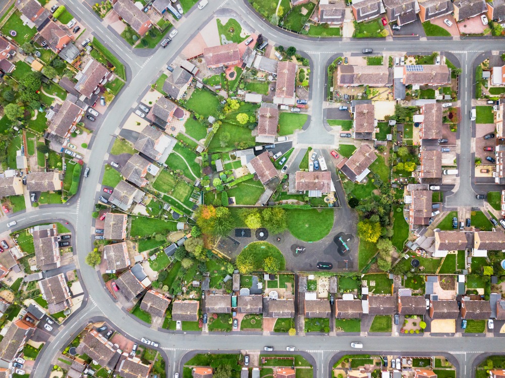 Aerial,View,Of,Traditional,Housing,Estate,In,England.,Looking,Straight